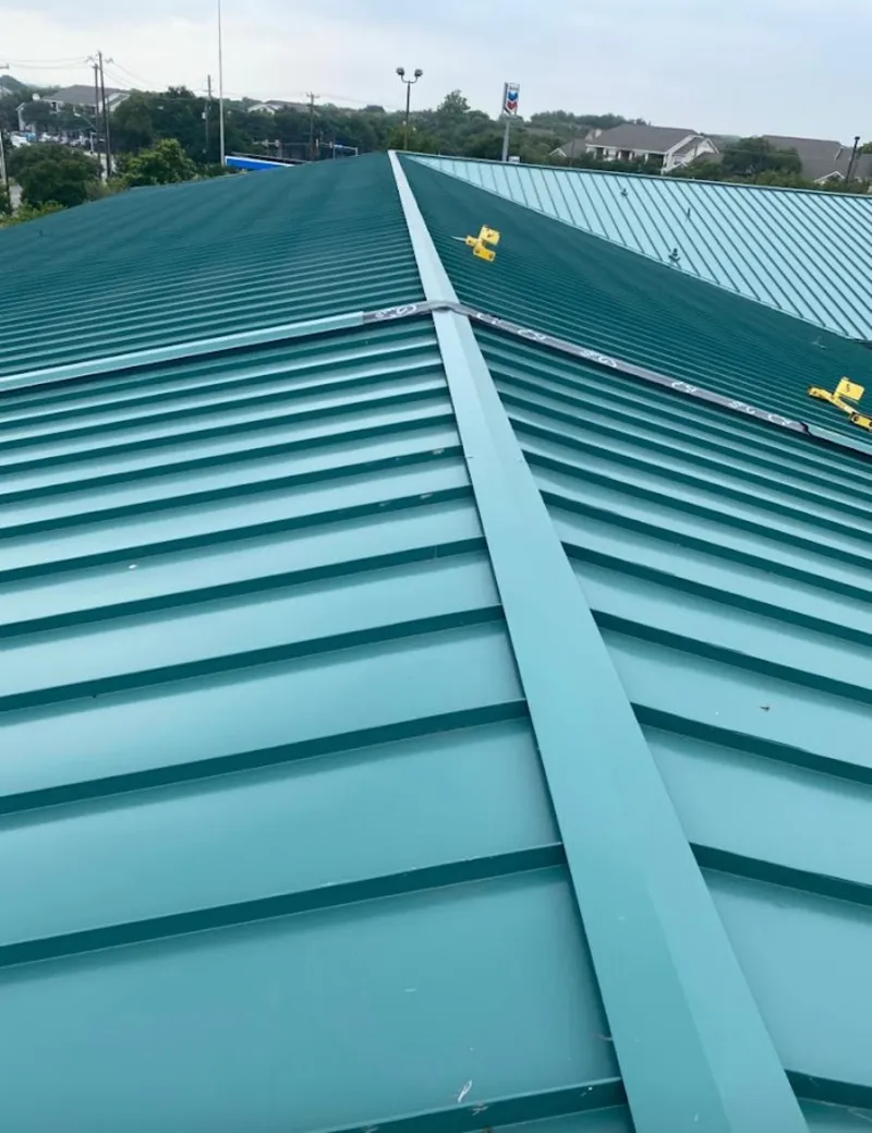 Green commercial metal roof ridge and valley for Metal Roof Repair in West Whittier-Los Nietos